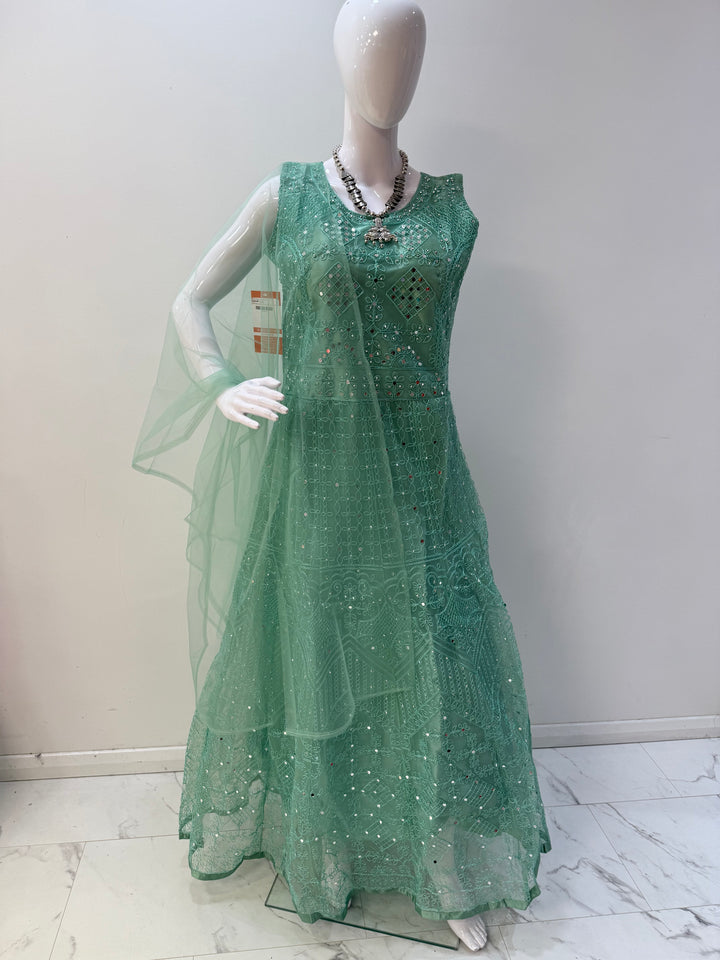 Elegant Mint Green Embroidered Net Gown with Long Sleeves – Perfect for Graceful Occasions